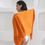 Beach Towel - Stella (Orange) Lifestyle Full View Of Pattern